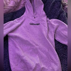 Glossier White Hoodie with black specs.